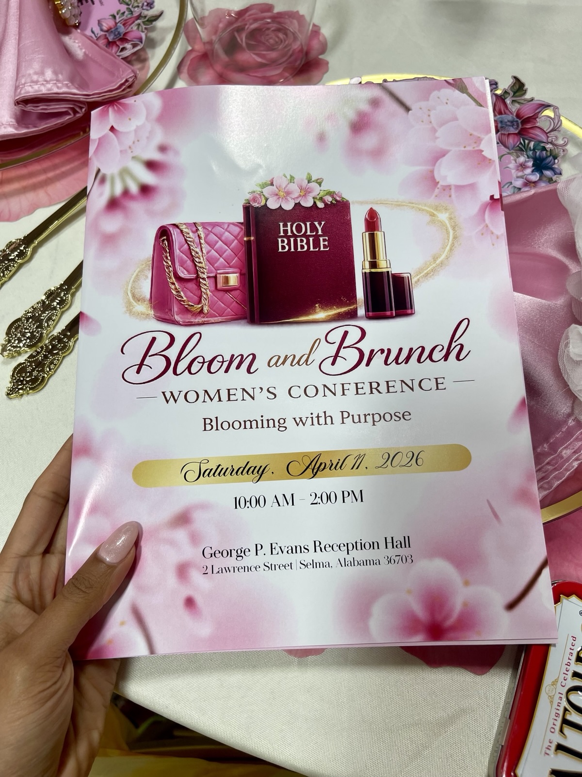 A Bloom and Brunch Women’s Conference program held up in the Studio